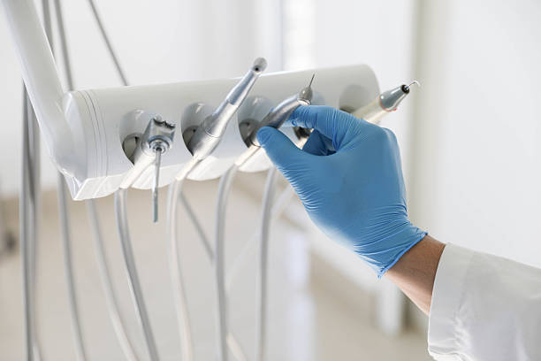 Professional Emergency Dentist technician working in Plattsburgh, NY